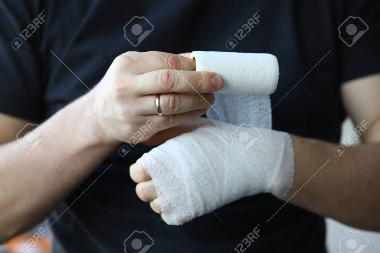 Male Hand With Tight Elastic Bandage On Arm Closeup. Self Help.. Stock Photo, Picture And Royalty Free Image. Image 136325573.